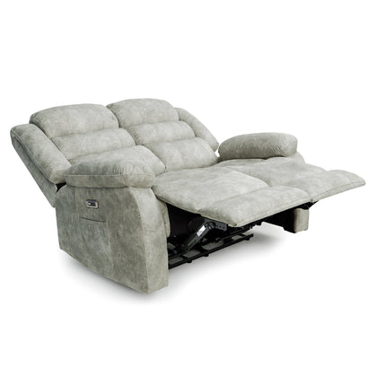 A three-seat power recliner sofa upholstered in a textured light gray fabric, shown in a fully extended reclined position on a white background.