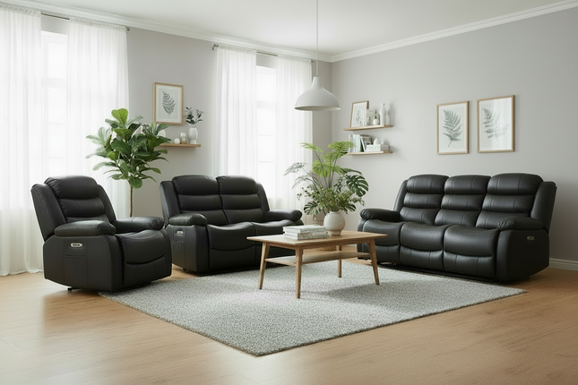 Modern living room with black leather sofas and a wooden coffee table.
